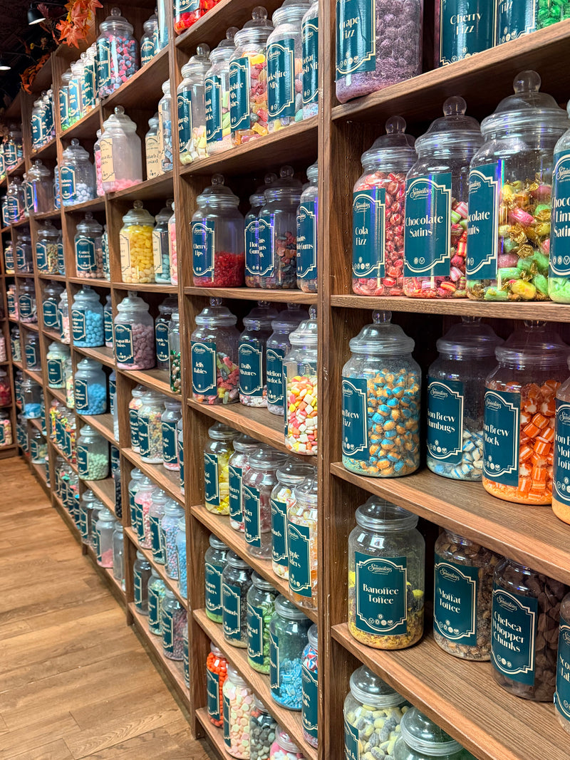 Shelves of traditional sweet jars inside Mr Swainstons sweet shop, South Shields